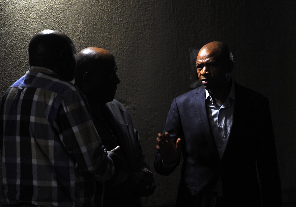 North West Premier Supra Mahumapelo interacts with journalists moments after President Cyril Ramaphosa called for calm in Mahikeng. Picture: Felix Dlangamandla/Netwerk24