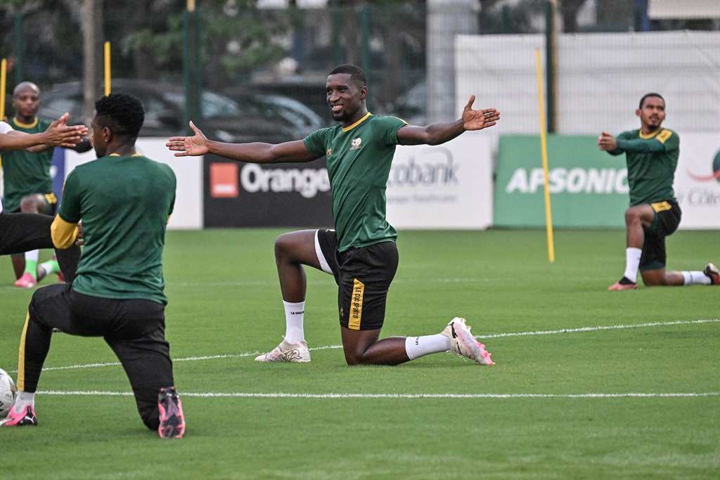 Bafana Bafana players - Siyanda Xulu (C) - attend a training session at the Lycee Classique stadium in Abidjan on 9 February 2024, on the eve of the 2024 African Cup of Nations (CAN) football match for third place between South Africa and DR Congo.
