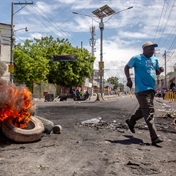 Haitian police fire tear gas as thousands protest against government