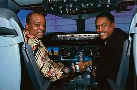 King Mswati III (left) at the controls