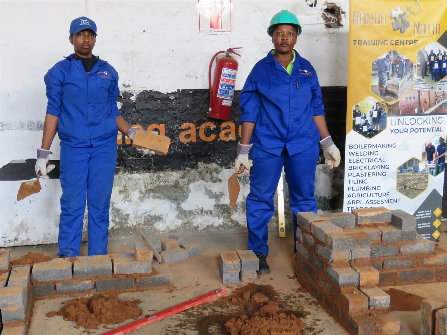 Nelisiwe Nkosi and Khethokuhle Hlongwane learn how to build at Hambanathi Training Centre. Photos by Ntebatse MasipaPhoto by 