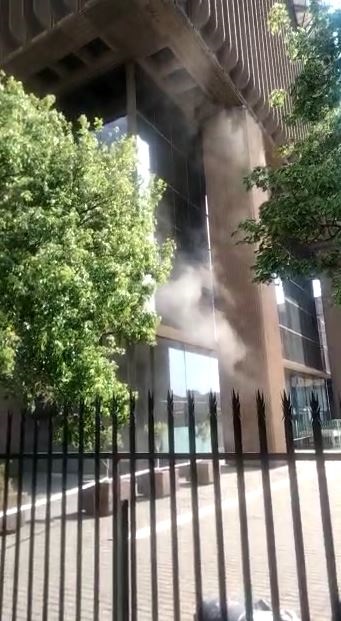 Screengrab of smoke coming out of the   housing two government departments, the Gauteng Department of Health and the Transport Department. 