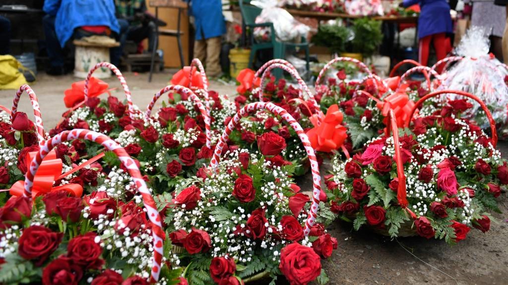 Baskets with roses are for sale for Valentine's Day at a flower shop in Nairobi. (Simon Maina/AFP)
