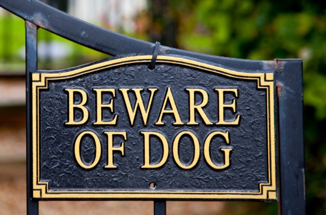 do beware of dog signs make you liable