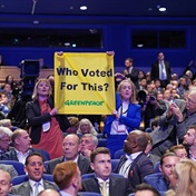 'Who voted for fracking?': Greenpeace protesters disrupt UK PM's speech at party conference