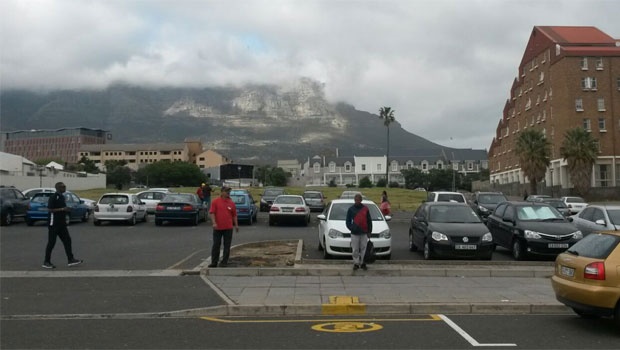 Three lonely protesters on Keizersgracht Street in Cape Town. News24's Paul Herman says it looks as if the Cape Town march, initially planned to start at 10:00, will start a half an hour later. <br />