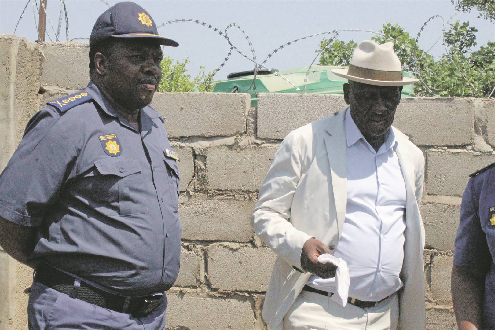 Fannie Masemola and Bheki Cele visit the crime scene