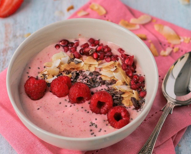 a fresh smoothie bowl with fruit on it