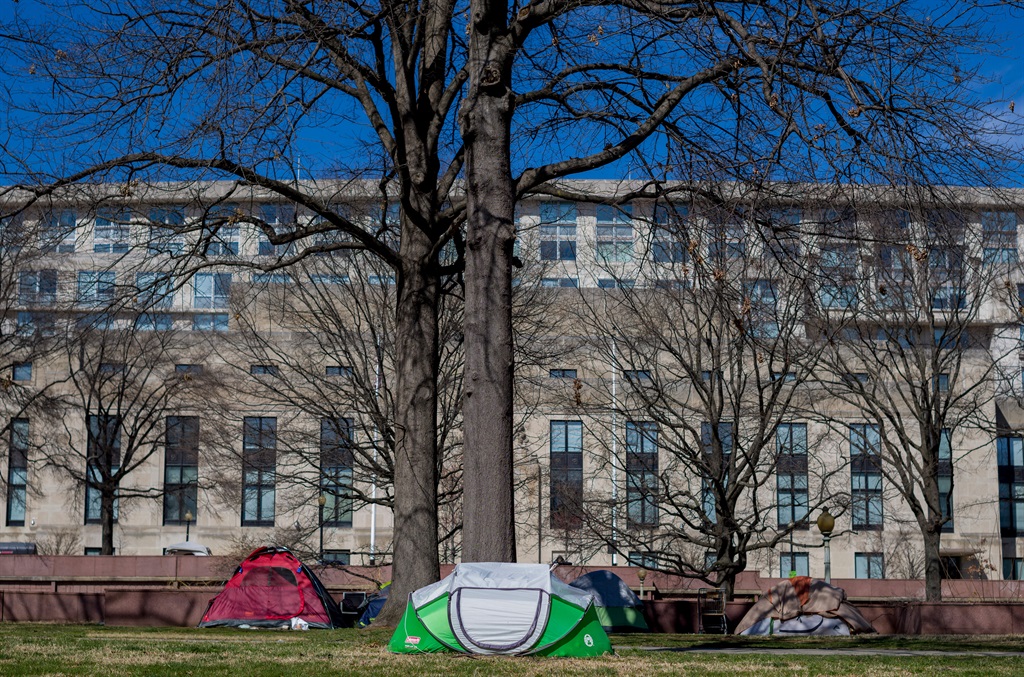 Tents are seen at a homeless encampment in the Foggy Bottom neighborhood of Washington, DC on March 14, 2022.