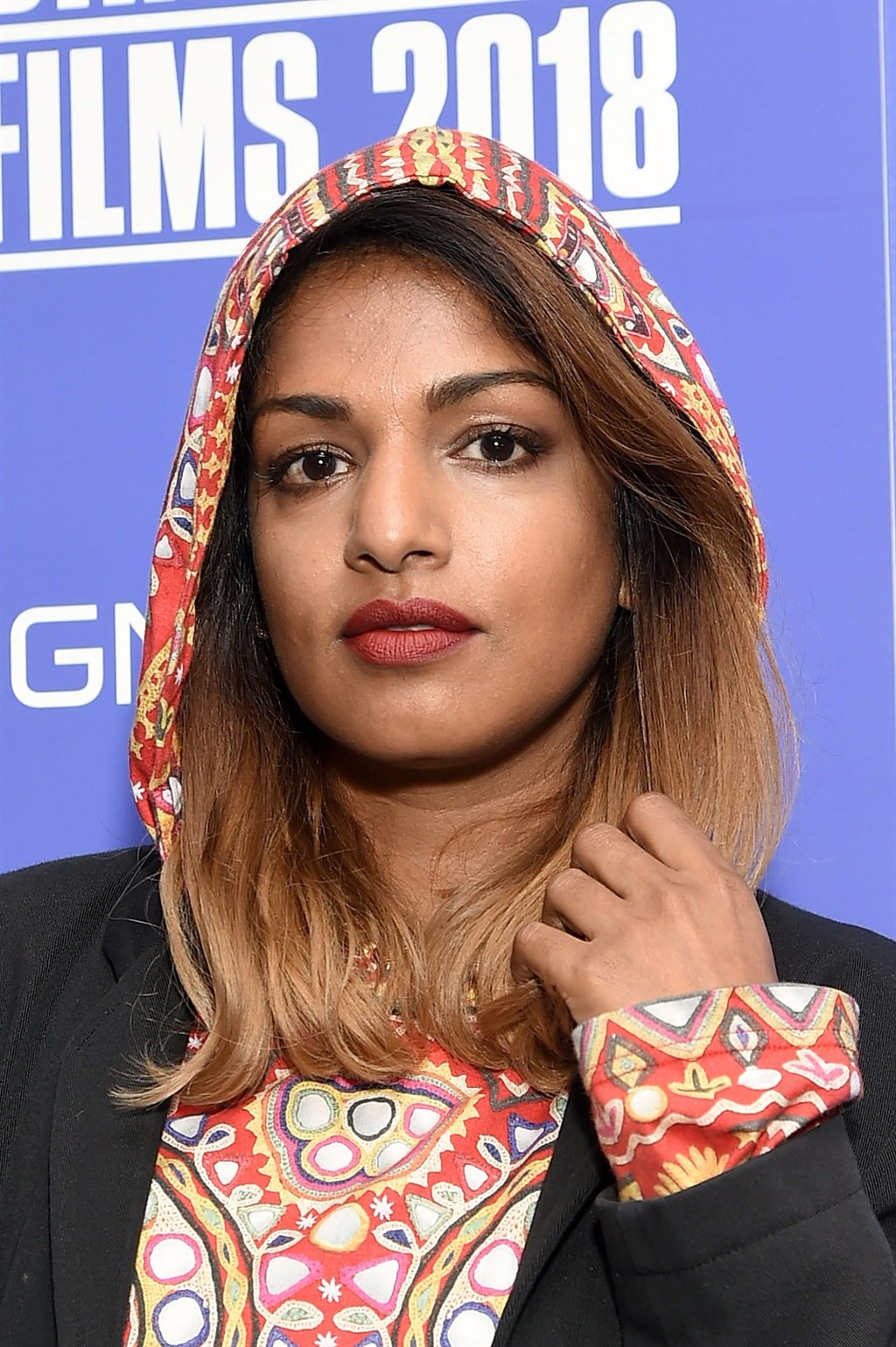 fist in the air Always unpredictable, rap star M.I.A. is packing for Johannesburg PHOTO: Mike Coppola / Getty Images