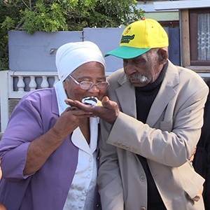 Fredie Blom celebrates his 114th birthday with his wife. (Screengrab)