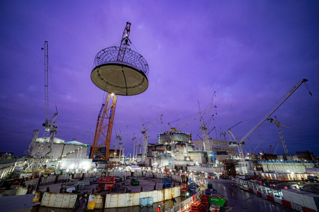 Construction work at the UK's Hinkley Point C reactor building in December 2023, where engineering teams used the world's largest crane to lift a 245-tonne steel dome on top of the 44-metre high reactor building. (Photo by Ben Birchall/PA Images via Getty Images)