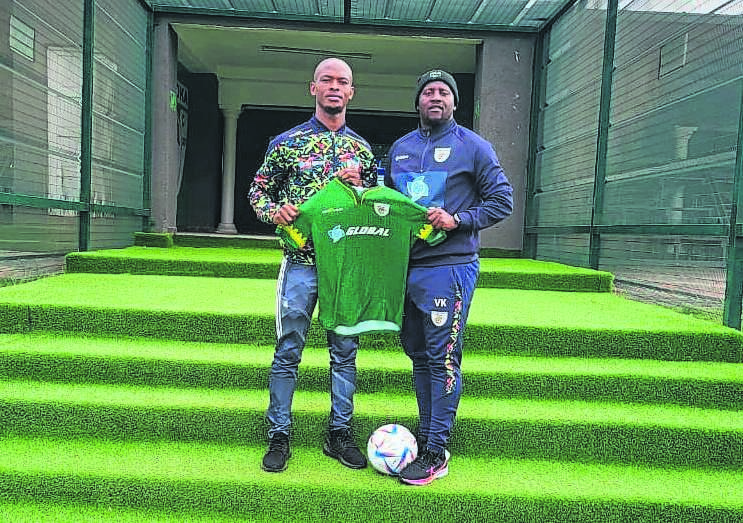 Baroka midfielder Phumlani Ntshangase (left) and his coach, Vincent Kobola.