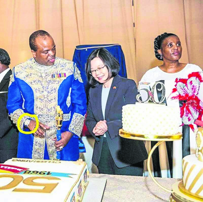 a royal disgraceKing Mswati III (far left) wore a watch worth millions and a jacket that dripped with diamonds to his 50th birthday party. Taiwan President Tsai Ing-wen (middle) attended the event