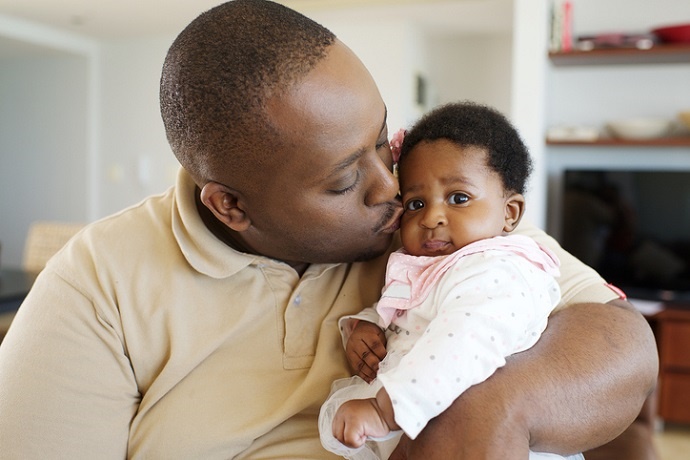 A strong father-child resemblance equals greater health for babies. 