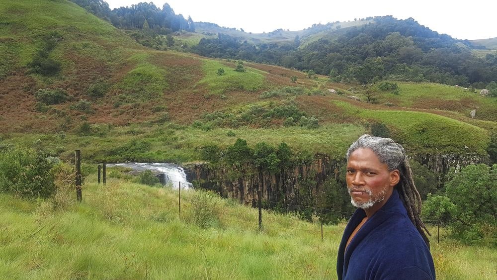 Actor Odwa Shweni in front of the waterfall where he fell to his death. Cast and crew say he was happy and enjoying his first major role. Picture: Supplied