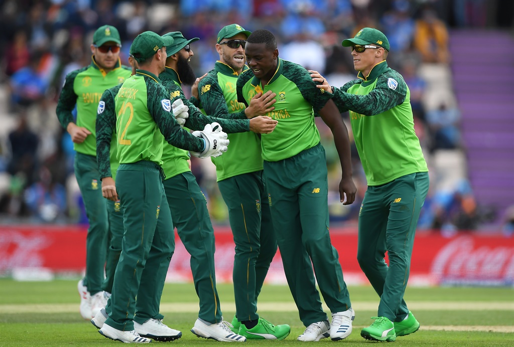 Kagiso Rabada of South Africa celebrates the wicket of Shikhar Dhawan of India with his teammates during the Group Stage match of the ICC Cricket World Cup 2019 between South Africa and India