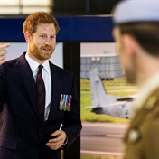 Prince Harry to receive aviation honour in ceremony hosted by John Travolta