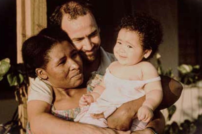 Ntombi and John Carneson (pictured here with their first child, Busi) married a year before the repeal of the Immorality and Mixed Marriages Acts, which outlawed marriage between whites and any other designated race.