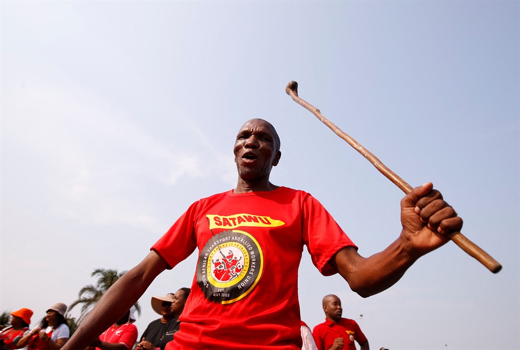 A Transnet worker protests as the labour unions strike continues. Photo: Reuters / Rogan Ward