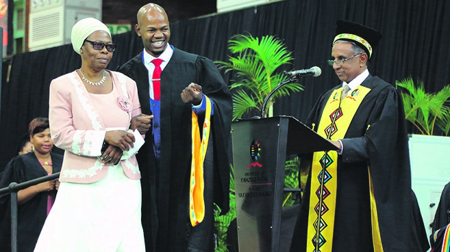 Lucky Shange was accompanied on stage by his mother Thembi Dlodlo for his graduation. 