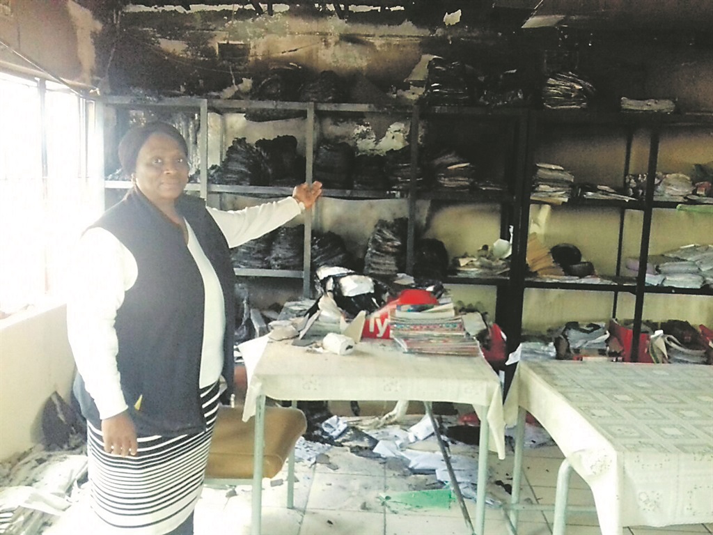 Principal Maryln Mokwele in the burnt staff room.Photo by Bongani Mthimunye