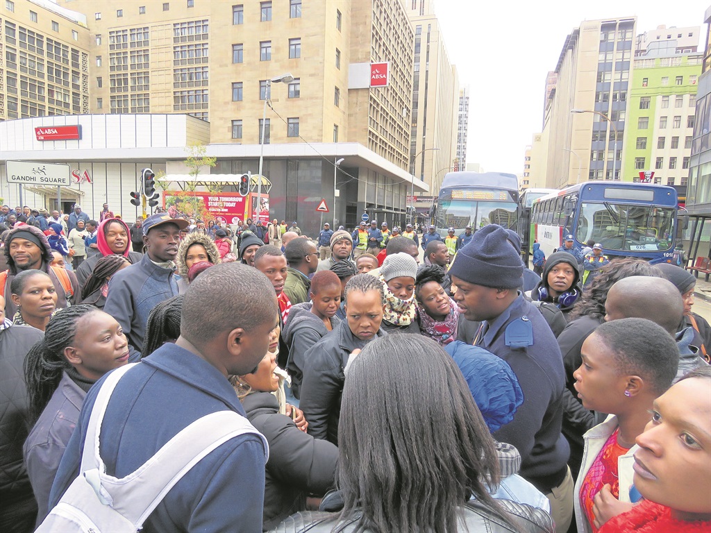 Angry commuters stopped buses from leaving Gandhi Square in Joburg yesterday, demanding to have their issues sorted out.Photo by Sthembiso Lebuso