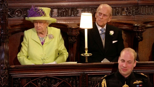 <p>Queen Elizabeth and Prince Philip listening attentively.&nbsp;</p><p></p>