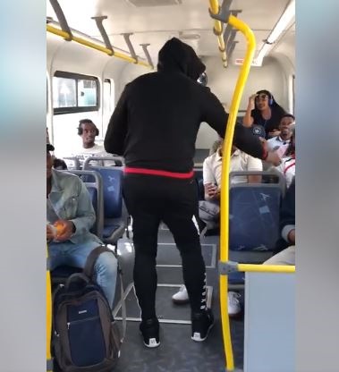 Malcolm x dishing out R100 notes to bus passengers 