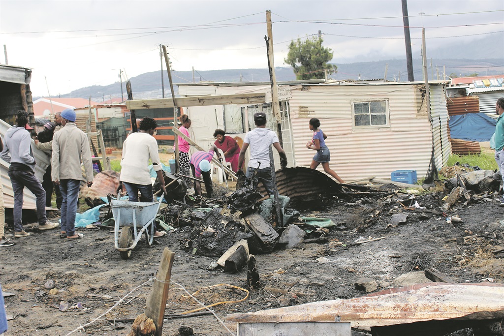 Fifteen people in Pholile were left homeless by a fire allegedly started by a jealous boyfriend.  Photo by Velani Ludidi