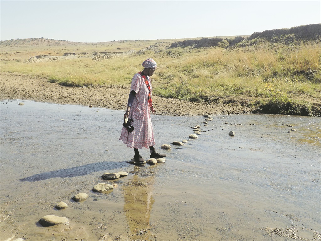 This river looks harmless, but Nokwazi Ntshangase says it’s prone to flooding.         Photo by Xolile Nkosi
