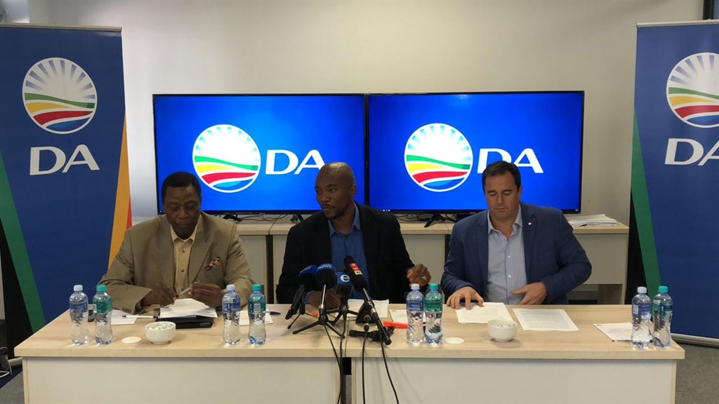 The Democratic Alliance leader Mmusi Maimane presents the party’s review of Cyril Ramaphosa’s 100 days in office. With him are the party’s chief whip John Steenhuisen and DA shadow minister in the presidency, Sejamothopo Motau. Picture: Twitter/@Our_DA