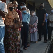 Malaysians vote in tightly contested election