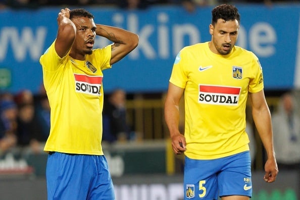 Westerlos South African forward Lyle Foster (L) and Westerlos Belgian midfielder Nacer Chadli react during a soccer match between Club Brugge KV and KVC Westerlo, in Brugge on October 8, 2022, on day 11 of the 2022-2023 Jupiler Pro League first division of the Belgian championship. - Belgium OUT (Photo by KURT DESPLENTER / BELGA / AFP) / Belgium OUT (Photo by KURT DESPLENTER/BELGA/AFP via Getty Images)