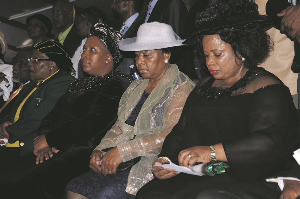 Sam Nzima's wife Thelma is flanked by Mpumalanga Premier Refilwe Mtsweni (left) and deputy speaker Violet Siwela.                             Photo by Oris Mnisi