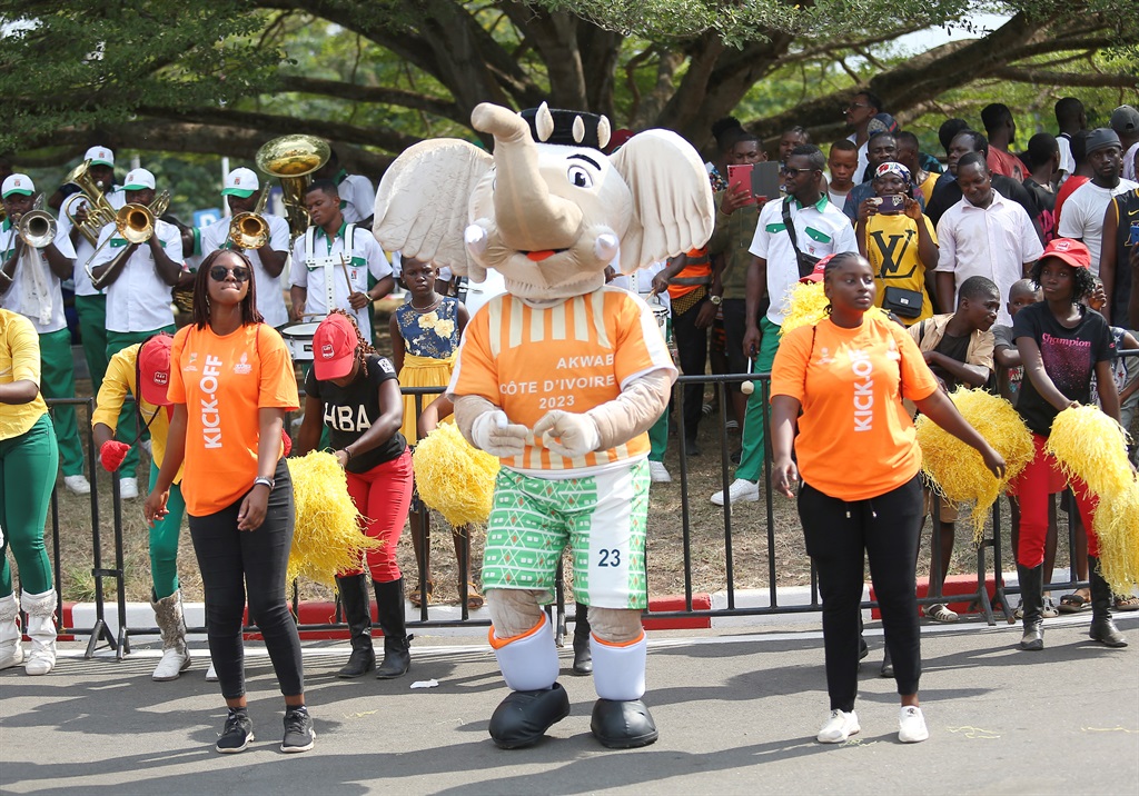 Afcon mascot Akwaba welcomes players ahead of the kick off of the tournament in the Ivory Coast from 13 January to 11 February.