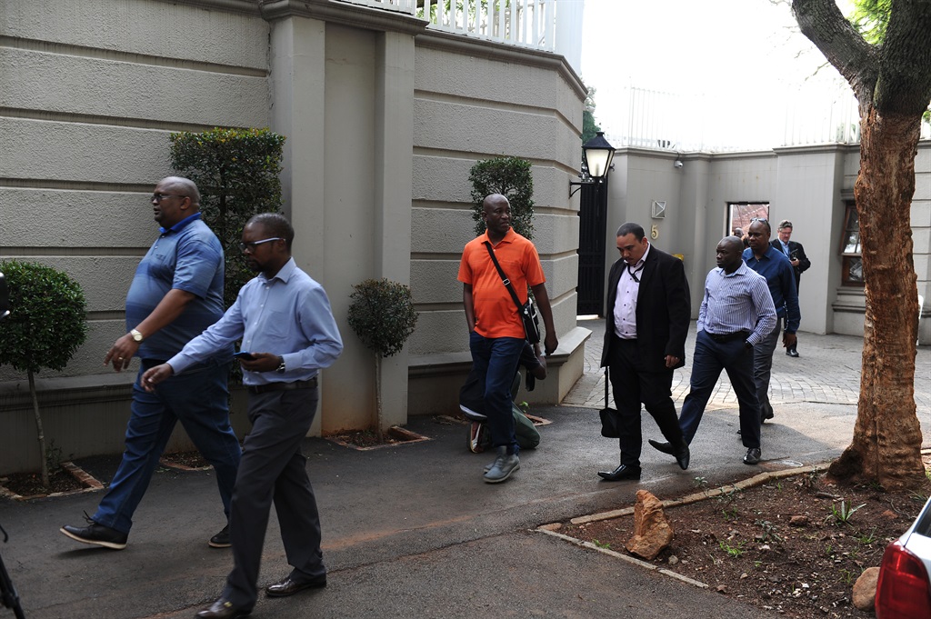 Law enforcement agencies were seen entering and exiting the Gupta compound in what is believed to be a raid at the property foto Felix Dlangamandla Picture: Felix Dlangamandla