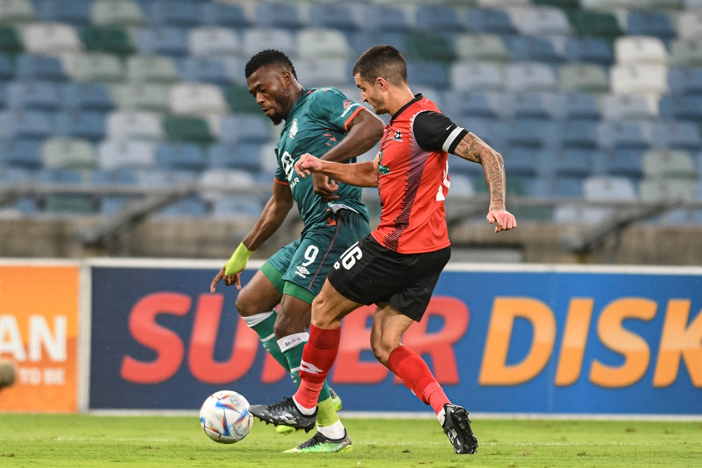 DURBAN, SOUTH AFRICA - OCTOBER 19: Augustine Kwem of AmaZulu FC and Keegan Ritchie, captain of Maritzburg United during the DStv Premiership match between AmaZulu FC and Maritzburg United at Moses Mabhida Stadium on October 19, 2022 in Durban, South Africa. (Photo by Darren Stewart/Gallo Images)