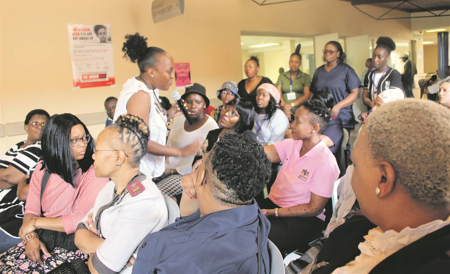Dr Monde Hute explaining that eczema is a chronic genetic condition that starts from a very young age, is not contagious and can be controlled with medication.                                        Photo by Tumelo Mofokeng