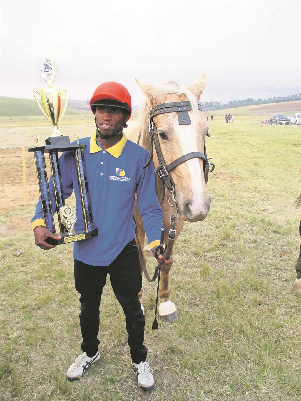 Jockey Siyabonga Mabaso won the main race with his horse Album.          Photo by Zimbili Vilakazi