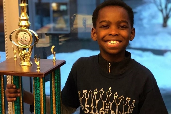 8-year-old Tanitoluwa Adewumi was crowned as a New York State Scholastic chess champion on March 10. (GoFundMe) 