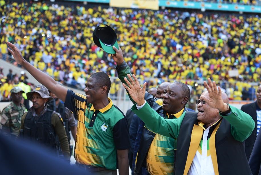 President Jacob Zuma, deputy Deputy President Cyril Ramaphosa and Gauteng chairperson Paul Mashatile wave to ANC supporters as they enter the FNB stadium at the party's Gauteng manifesto launch. Picture: Leon Sadiki/City Press 