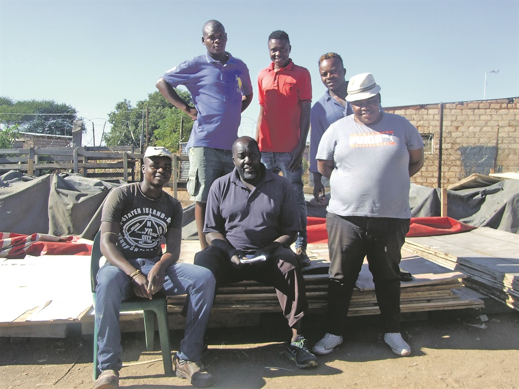 Members of Maplangkeng Social Club at Dube Stand in Winterveld, north of Tshwane.         Photo by  Abel Mabena