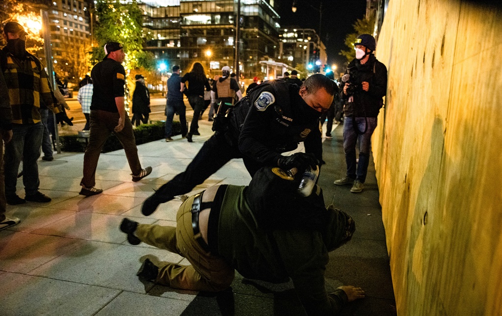 Trump supporters clash with police