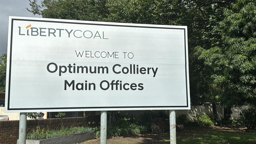 A sign at Optimum Mine showing new ownership