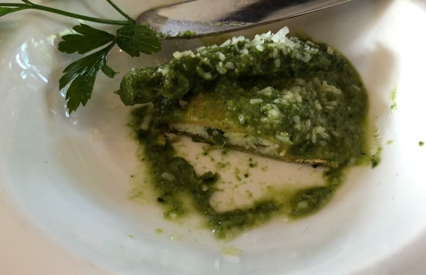 serving of agnolotti filled with spinach and aspar