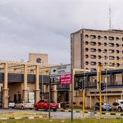 Step inside Africa's biggest hospital as health workers and admin staff walk out