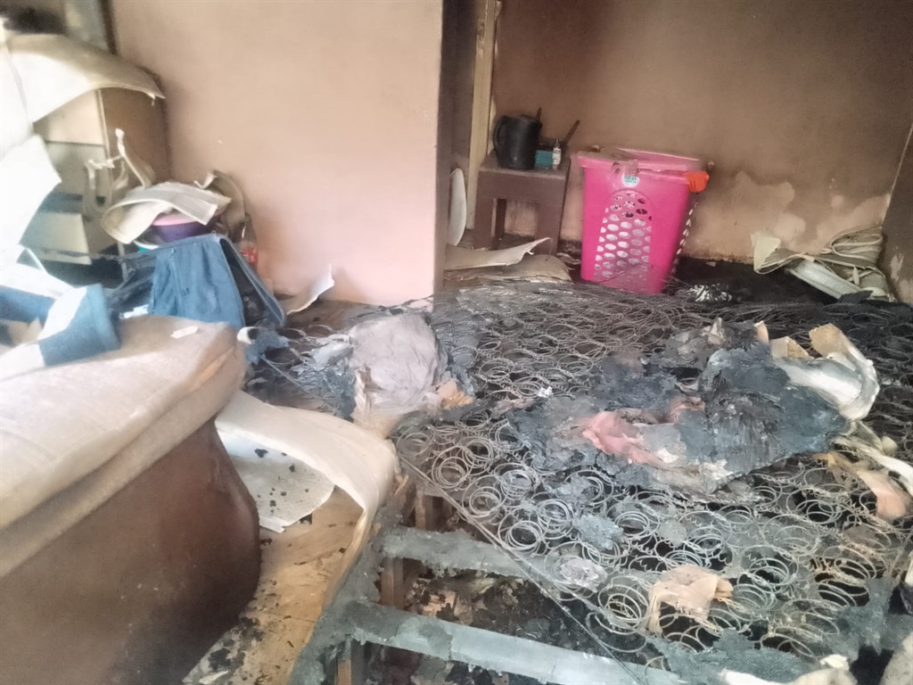 Thugs who couldn't break into a room in Mfuleni set it on fire. Photo by Lulekwa Mbadamane