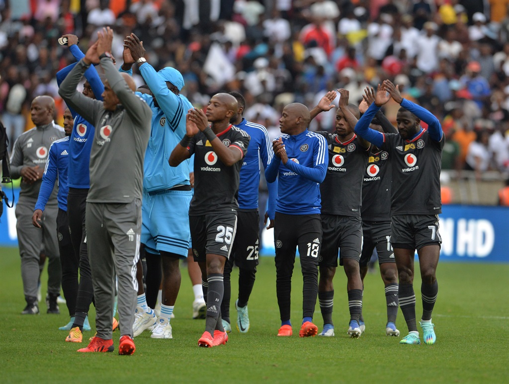 POLOKWANE, SOUTH AFRICA - OCTOBER 22: Orlando Pirates players celebrate their win at the end of the MTN8 2nd leg semi-final match against Mamelodi Sundowns at Peter Mokaba Stadium on October 22, 2022 in Polokwane, South Africa. (Photo by Philip Maeta/Gallo Images)