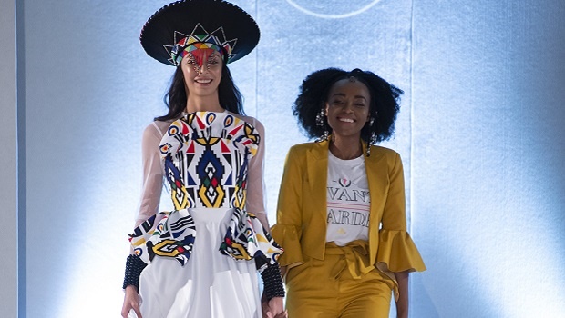 Sandi Mazibuko (right) with a model wearing one of her designs at Oxford Fashion Week